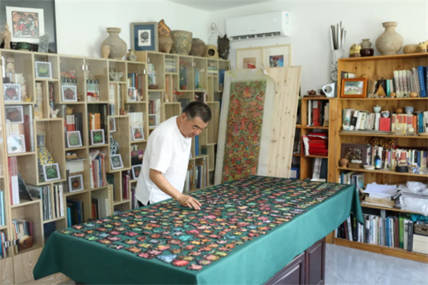 郭万祥-胶东剪纸艺术-简历670.png